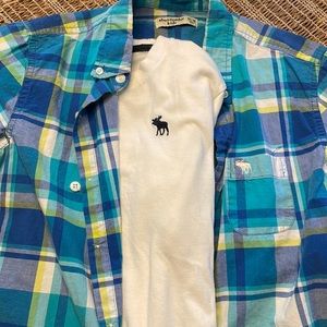Short sleeve plaid button down with white tee underneath